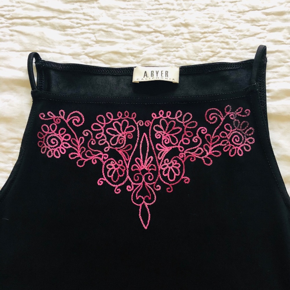 Juniors black top with embroidered design